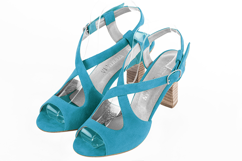 Turquoise blue women's open back sandals, with crossed straps. Round toe. High kitten heels. Front view - Florence KOOIJMAN